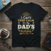 I Can't Keep Calm It's My Dad's Birthday text with crown graphic on a black t-shirt