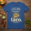I can't make everyone happy. I'm not a taco. CERTIFIED MOOD BOOSTER text on a blue t-shirt with a smiling