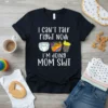 Black t-shirt with white text "i can't talk right now I'M DOING MOM SHit" and graphics of a diaper, snack