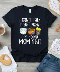 Black t-shirt with white text "i can't talk right now I'M DOING MOM SHit" and graphics of a diaper, snack