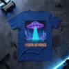 I Come In Peace t-shirt design with a neon UFO beaming down on a retro futuristic city skyline at night