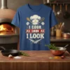 I Cook As Good As I Look quote on a blue t-shirt with chef hat and crossed knives graphic