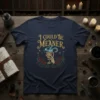 Navy t-shirt with "I Could Be Meaner" in gold script, featuring a skeleton hand holding a chalice with blue smoke