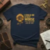 I Could Be So Much Worse I Could Start Acting Like My Dad quote t-shirt with a sunflower graphic in