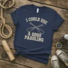 Navy blue t-shirt with "I Could Use A Good Paddling" text and crossed canoe paddles graphic in cream