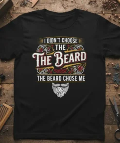 I Didn't Choose The Beard The Beard Chose Me quote on a black t-shirt with decorative border and beard graphic