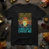 I didn't choose the nug life nug life chose me text on a black t-shirt with a cartoon chicken nugget