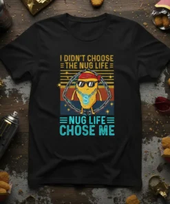 I didn't choose the nug life nug life chose me text on a black t-shirt with a cartoon chicken nugget
