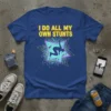 I Do All My Own Stunts quote on a blue t-shirt with a silhouette performing a stunt within a starburst