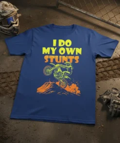I Do My Own Stunts motocross rider graphic tee in yellow and orange on a navy blue t-shirt