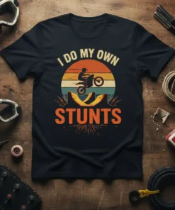 I Do My Own Stunts motocross t-shirt with a rider performing a stunt against a retro sunset background