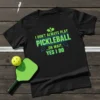 Black t-shirt with green and blue text that reads "I DON'T ALWAYS PLAY PICKLEBALL ...OH WAIT, YES I DO" and