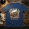 I Don't Always Stop and Look at Trains quote with vintage steam engine graphic on a navy blue t-shirt