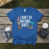 I DON'T DO MATCHING SHIRTS quote with mismatched socks, boots, and heels graphic on a blue t-shirt