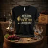 Black t-shirt with gold text "I DON'T DRINK BECAUSE I WENT PRO & RETIRED EARLY" and a wine glass graphic