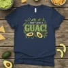 I Don't Give A Guac! text with avocado graphics on a navy blue t-shirt