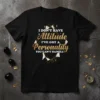 Black t-shirt with gold and white text: "I DON'T HAVE Attitude I'VE GOT A Personality YOU CAN'T HANDLE" in a