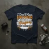 I Don't Have Enough Middle Fingers For Cancer quote on a dark navy t-shirt, featuring bold orange and white typography