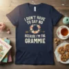 Navy t-shirt with "I Don't Have to Say No Because I'm The Grammie" text and floral wreath graphic