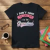 T-shirt with text "I DON'T HAVE TO SAY NO I'M THE Grandma" in pink and white gradient lettering