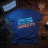 Blue t-shirt with neon text "I DON'T KNOW GOOGLE IT!!" in a search bar design, featuring digital graphics