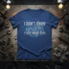 I DON'T KNOW I JUST WORK HERE quote with gear graphic on a blue t-shirt