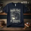 I DON'T LIKE MORNING PEOPLE OR MORNINGS OR PEOPLE text with a grumpy black cat holding a coffee cup on