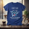 Blue t-shirt with "I DON'T LIKE PEOPLE IN THE MORNING! BETTER STAY AWAY..." text and a grumpy cat holding coffee
