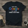 Black t-shirt with the text "I DON'T NEED Google MY WIFE KNOWS EVERYTHING!" in white and colorful Google-style font