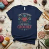 I Don't Need Therapy I Just Need To Crochet text with heart-shaped yarn ball and needles graphic on navy t-shirt