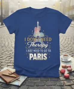 T-shirt with "I DON'T NEED Therapy I JUST NEED TO GO TO. PARIS" quote and Eiffel Tower graphic in gold