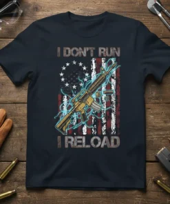 "I Don't Run I Reload" text with AR-15 and distressed American flag design on a navy t-shirt