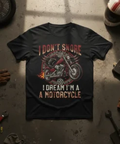 I DON'T SNORE I DREAM I'M A MOTORCYCLE text with a winged motorcycle graphic on a black t-shirt