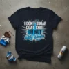 I Don't Sugar Coat Shit I'm Not Willy Wonka quote t-shirt design in white and blue typography with starburst background