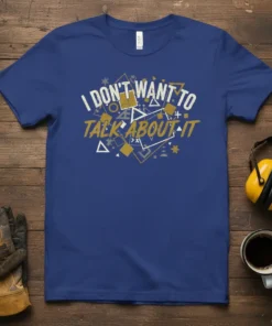 I Don't Want To Talk About It quote on a blue t-shirt with abstract geometric shapes in white and gold