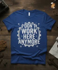"I Don't Work Here Anymore" quote in distressed white text on a blue t-shirt, framed by gears and bolts