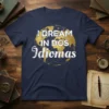I DREAM IN DOS Idiomas text on a navy blue t-shirt with a gold distressed globe graphic