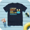 Navy t-shirt with colorful text "I DRINK BEER AND PEE IN POOLS" and cartoon beer mugs by a pool graphic