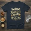 I Drink My Horchata Warm Because Fuck Ice text design on a navy t-shirt with ornate embellishments and coffee cup
