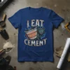 I Eat Cement cat design with a bucket of cement and lightning on a blue t-shirt