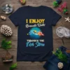 T-shirt with the text "I ENJOY Romantic Walks THROUGH THE Fish Store" and cartoon fish graphic