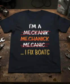 Navy t-shirt with "I'm A Mekanik Mechanick Mecanic ... I Fix Boats" text, humorously correcting spellings to highlight boat repair