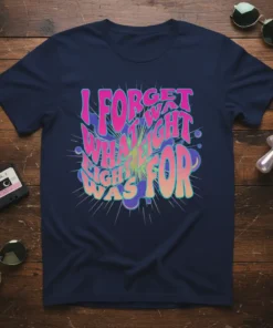 Navy t-shirt with vibrant pink and yellow text that reads "I FORGET WHAT FIGHT NIGHT WAS FOR" in a retro