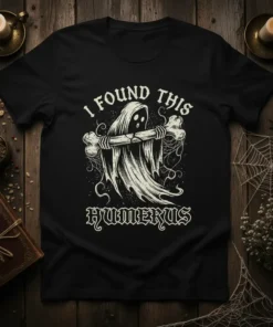 I Found This Humerus ghost pun t-shirt design with a playful ghost holding a bone, featuring distressed typography and spooky