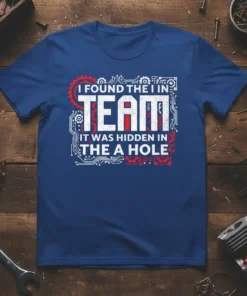I FOUND THE I IN TEAM IT WAS HIDDEN IN THE A HOLE quote on a blue t-shirt with circuit