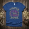 I Get My Attitude Pretty Much All The Women I'm Related To quote on a royal blue t-shirt with ornate