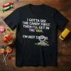 Black t-shirt with the quote "I Gotta See The Candy First. Then I'll Get In The Van. I'm Not Stupid."