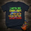 Halloween T-shirt with text "I Gotta See The Candy First Then I Get In The Van I'm Not Stupid" and