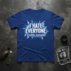 I HATE EVERYONE. STUPID FUCKERS. bold white text with blue lightning graphic on a royal blue t-shirt