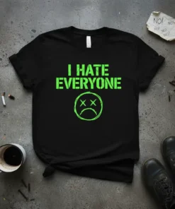 Black t-shirt with bright green distressed text "I HATE EVERYONE" and a sad face graphic with X eyes